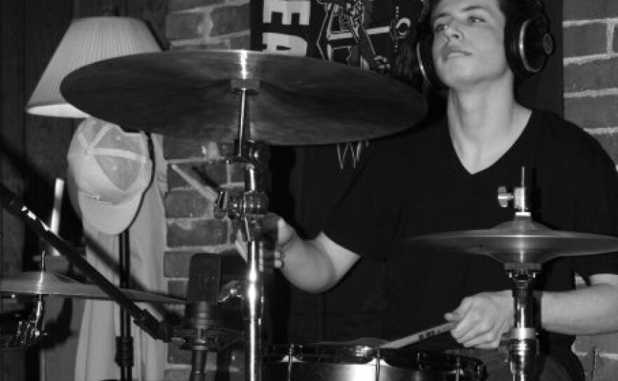 Max at his drum kit. Playing the drums was Max's passion, his family says, as was "creating original music, listening to jazz, rock, and blues, shooting pool, following the Red Sox and Patriots, playing fantasy football with his family, and enjoying card games and chess."