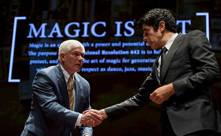 Texas Rep. Pete Sessions, left, shakes hands with magician David Copperfield at the U.S. Capitol during their event to push a resolution to recognize magic as an art form on Thursday, June 9, 2016.