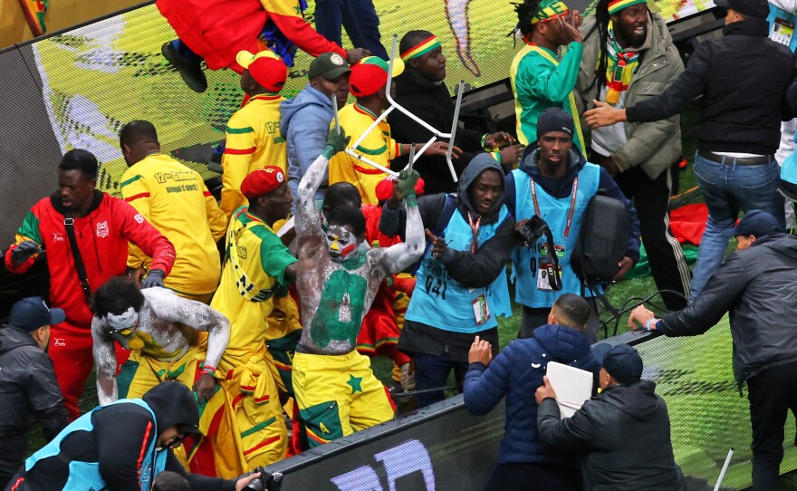 Senegal supporters protest after a controversial penalty was awarded to Morocco during the Africa Cup of Nations final soccer match between Senegal and Morocco on Jan. 18, 2026, in Rabat, Morocco.