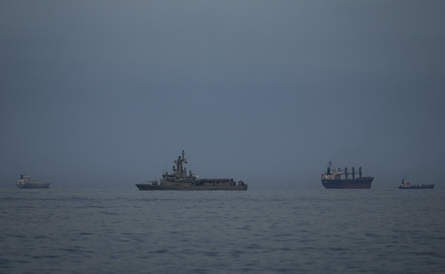 A shirt is seen hanging Sunday amid the rubble in the Beryanak District in Tehran, Iran, after it was damaged by missile attacks two days before.
