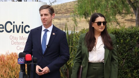 Reps. Mike Levin and Sara Jacobs stand outside the Otay Mesa Detention Center on Thursday, April 2, 2026.