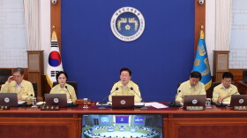 South Korean President Lee Jae Myung, center, speaks during a cabinet meeting at the presidential office in Seoul, South Korea, Tuesday, Aug. 18, 2026.