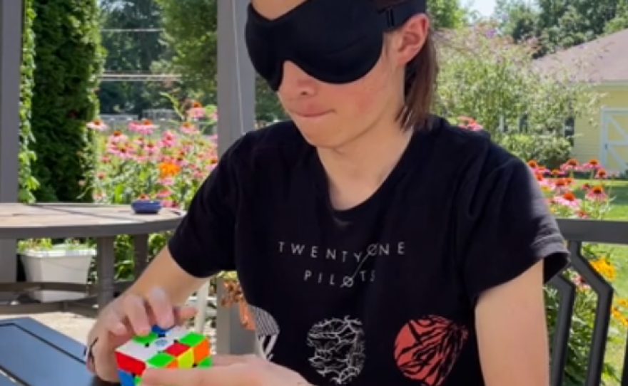 Juan Anselm solving a Rubik's Cube blindfolded.