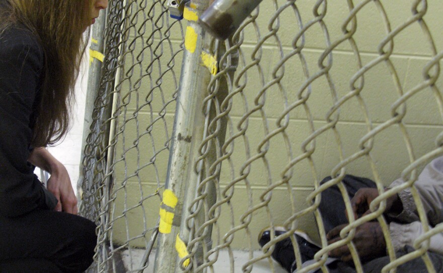 Elli Petacque Montgomery with the Cook County Sheriff's Office assesses a new inmate for mental illness.