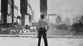 A policeman surveys the devastation on Osage Avenue on May 14, 1985.