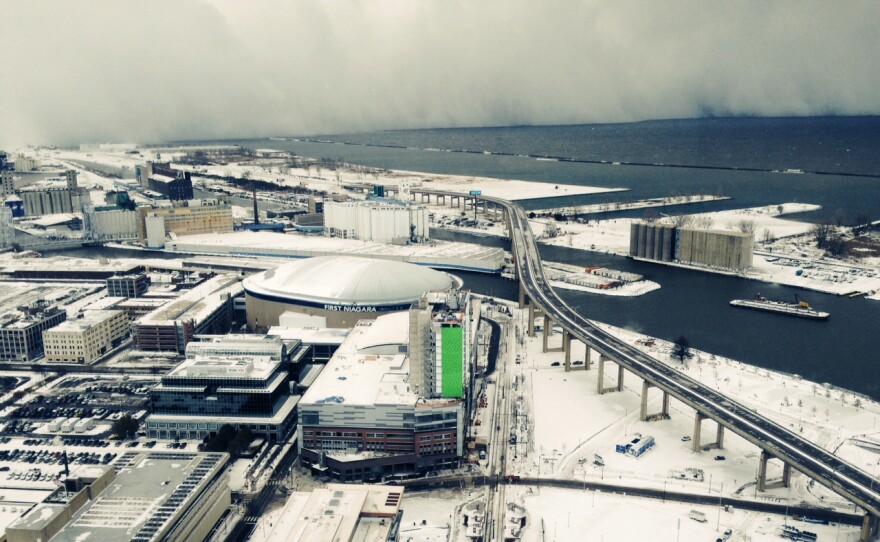 A band of storm clouds moves across Lake Erie and into Buffalo, N.Y., on Tuesday.