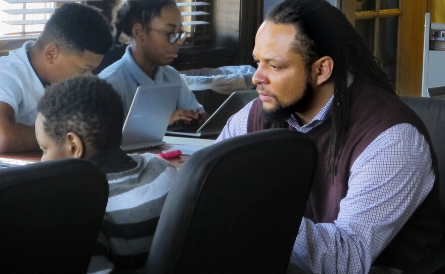 Henderson prepares his seventh-graders for a mock trial competition.