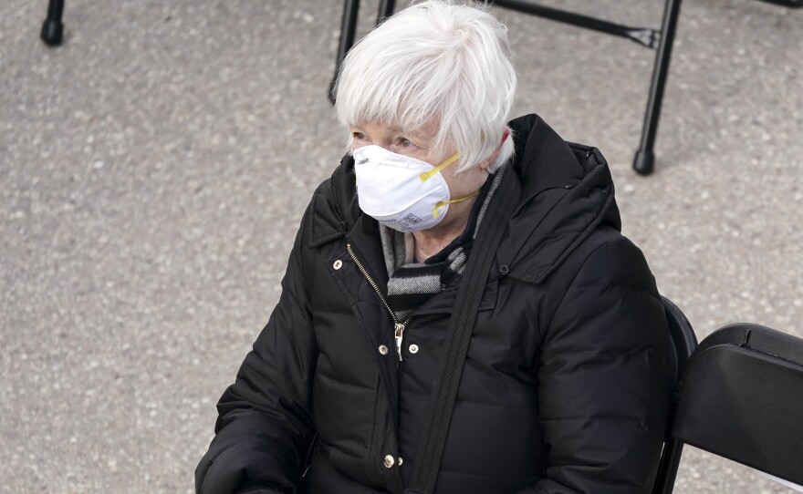 Janet Yellen, U.S. Treasury secretary nominee for President Biden, wears a disposable mask while attending the inauguration.