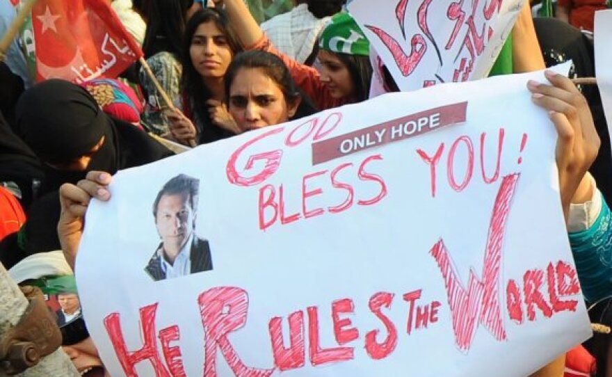 Khan's supporters, shown at rally in Lahore last month, enthusiastically back his anti-corruption message.