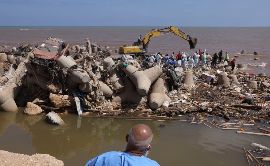 Rescue personnel work in the aftermath of deadly floods in Derna, Sept. 16.
