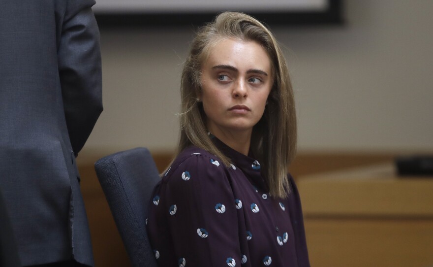 In this 2017 file photo, Michelle Carter sits in a district court in Taunton, Mass. Carter was sentenced to serve 15 months in prison for involuntary manslaughter for causing her boyfriend's death.