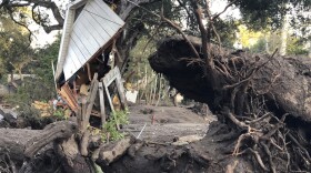 This photo provided by the Santa Barbara County Fire Department shows mud, boulders, and debris that destroyed homes that lined Montecito Creek near East Valley Road in Montecito, Calif., Wednesday, Jan. 10, 2018. 