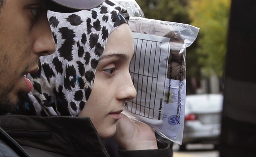 Ailiana Tsarnaeva, sister of Boston Marathon bombing suspect Dzhokhar Tsarnaev, departs district court in Boston's South Boston neighborhood in October.