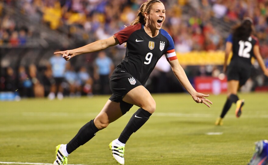 Heather O'Reilly of the U.S. women's national team celebrates after scoring a goal against Thailand in September 2016. The World Cup champion team and the U.S. Soccer Federation have settled on a wage deal, ratifying a contract that runs through 2021.