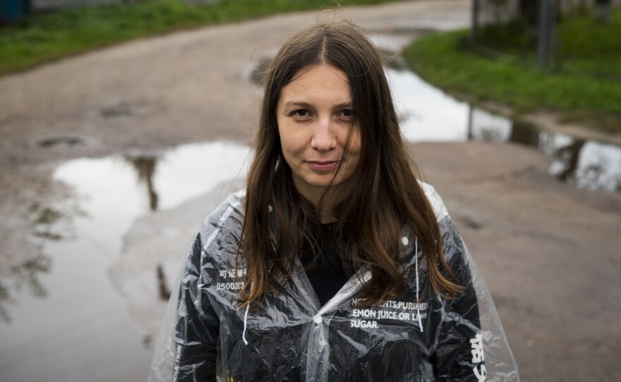 "We're not builders, yeah? We're just normal people," says Marina Hrebinna, one of the organizers of Repair Together, in Kolychivka. "But we have our bodies, we have our arms, we have our health."