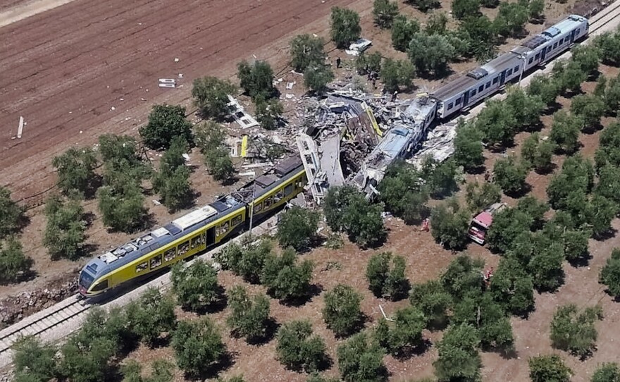 This aerial handout photo shows what is left of two commuter trains after their head-on collision in southern Italy on Tuesday.