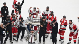 The Carolina Hurricanes celebrates after a win over the Vegas Golden Knights in Game 6 of the NHL hockey Stanley Cup Final series, Sunday, June 14, 2026, in Las Vegas.