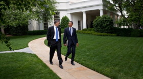 President Barack Obama and Education Secretary Arne Duncan walk from the Oval Office to the motorcade for the trip to Washington-Lee High School in Arlington, Virginia, May 4, 2012