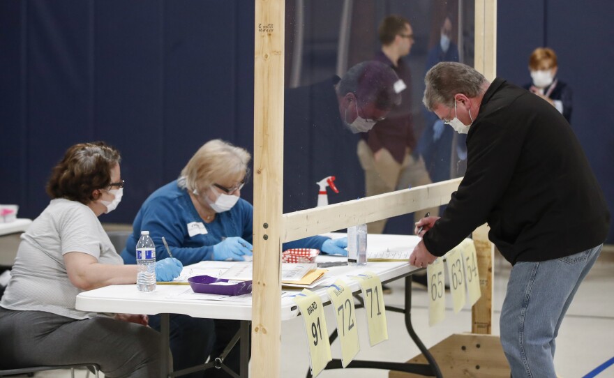 Voters in Kenosha, Wisc. on April 7, 2020. A new study suggests that in-person voting in that election did not produce a surge of new coronavirus cases.