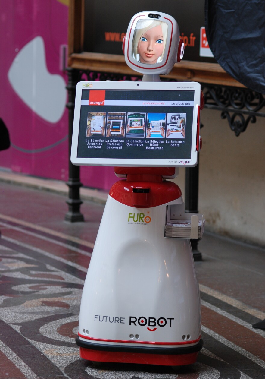 Future Robot's FURo robot acts as a host.