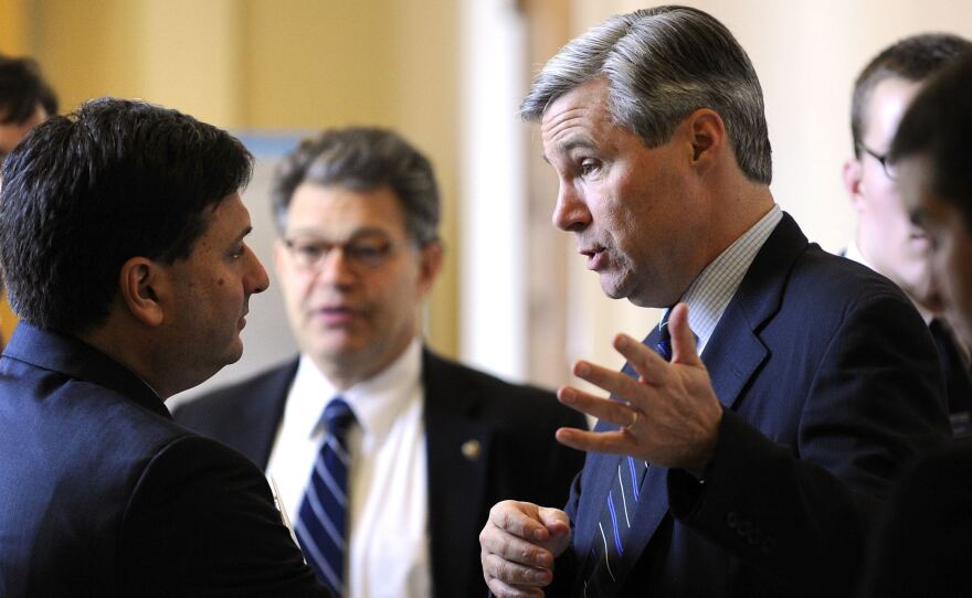 Ron Klain (left), then Chief of Staff for Vice President Biden, talks Sen. Sheldon Whitehouse (D-RI) on Capitol Hill in December 2009.