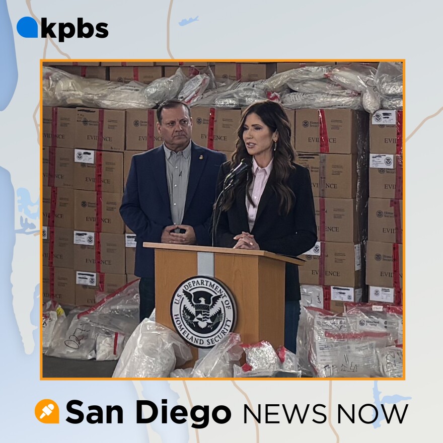 Homeland Security Secretary Kristi Noem is pictured at a podium during her visit to the Otay Mesa Port of Entry, Feb. 12, 2026.