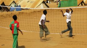 Yemeni boys play volleyball at the Mazrak camp in Yemen's northwestern Red Sea coastal plain, near the country's border with Saudi Arabia. Some 8,700 people displaced by the fighting between Yemeni army and Shiite rebels are living at the U.N. camp.