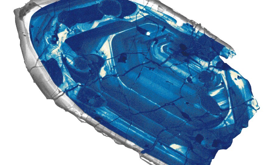 The colors of the zircon crystals range from transparent to deep red.