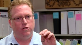 Attorney Cory Briggs speaks at a news conference, April 12, 2016.