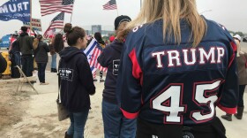 Protesters gather in Otay Mesa demonstrating their support for President Donald Trump as he visits the border wall prototypes, March 13, 2018. 