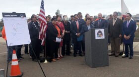 Caltrans Director Laurie Berman is joined by local and state politicians in Balboa Park announcing new infrastructure projects thanks to SB 1 funding, May 18, 2018.