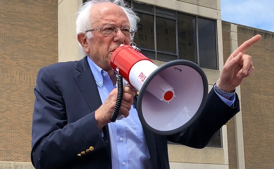 Democratic presidential candidate Bernie Sanders speaks to striking telecommunications workers on in Louisville, Ky.