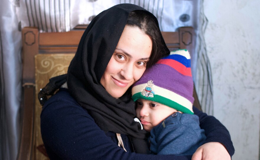 Abeer Mahameed, 29, who lives in Umm al-Fahm, embraces her two-year-old son, Mustafa. She heeded her municipality's boycott of Hamoud's film, saying it portrays Palestinian women as impure.