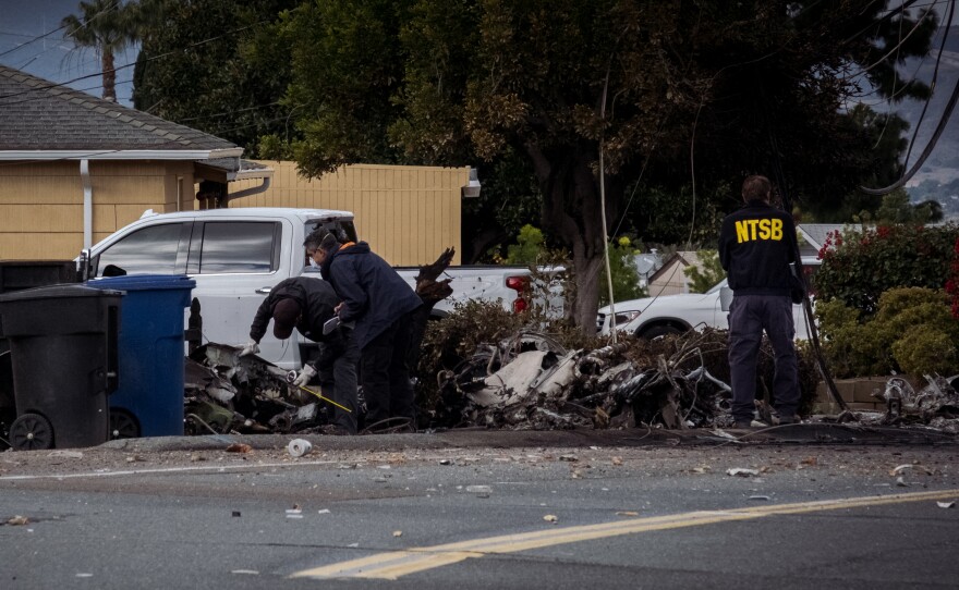 Investigators from the National Transportation Safety Board are on the scene of an airplane crash at the 1200 block of Pepper Drive in El Cajon, December 29, 2021.