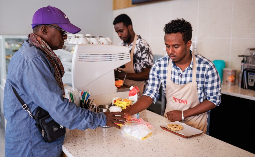 A barista at Beydan Coffee, part of a chain of fancy coffee shops in Mogadishu set up by a couple who'd emigrated to Canada years ago and then returned to Somalia.