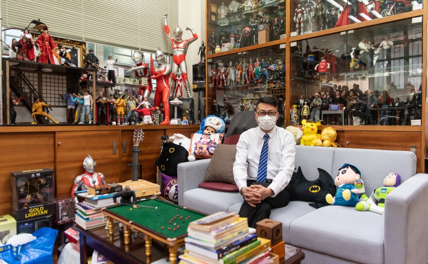 Lobo Ho, principal of Maryknoll Fathers' Secondary School, fills his office with toys and figurines so a visit to the principal won't be a negative experience.