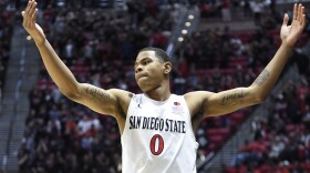 San Diego State forward Keshad Johnson (0) celebrates after the team defeated Wyoming 67-49 in an NCAA college basketball game, Tuesday, Jan. 21, 2020, in San Diego.
