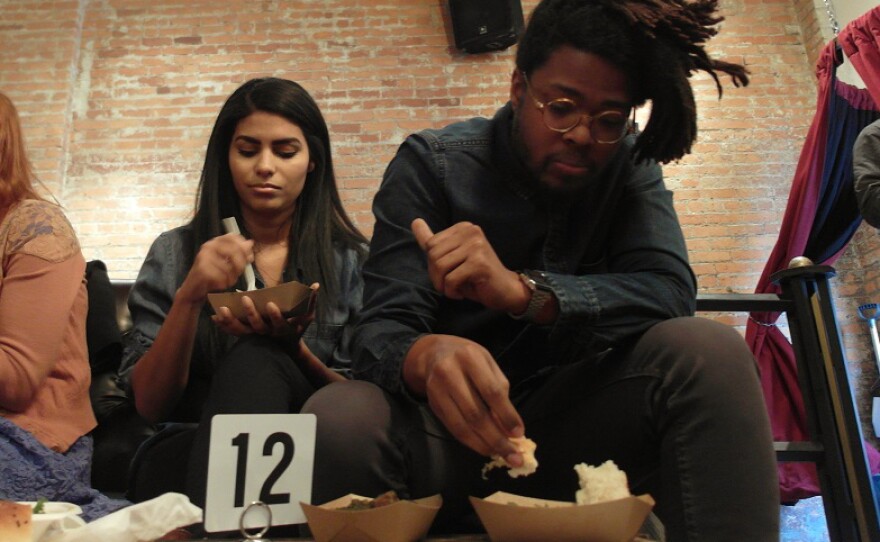 Norris Howard (right) and Latasha James attended the Peace Meal Kitchen pop-up in Detroit on Saturday in support of immigrants impacted by the travel ban.