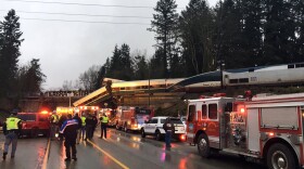This photo provided by Washington State Patrol shows an Amtrak train that derailed south of Seattle on Monday, Dec. 18, 2017. Authorities reported "injuries and casualties." The train derailed about 40 miles (64 kilometers) south of Seattle before 8 a.m., spilling at least one train car on to busy Interstate 5. 