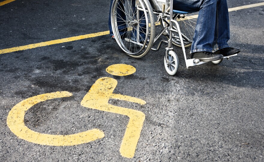 More than 1,500 business owners in Arizona have been sued recently by a nonprofit for allegedly violating the Americans with Disabilities Act. But critics of the cases call the group's effort a scam.