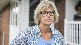 Maria Ruhtenberg, an attorney with the Iowa Office of the State Public Defender, has settled with the state after she was fired and later reinstated following online comments she made about the shooting death of conservative activist Charlie Kirk.