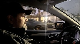 Benjamin Prado, an immigrant rights activist with Union del Barrio, drives around Linda Vista Friday, Feb. 7, 2025.