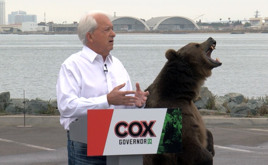 North County businessman and gubernatorial candidate John Cox appearing with Tag the bear at a campaign stop in Shelter Island, May 11, 2021.