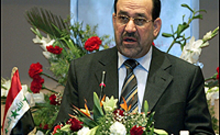 Iraqi Prime Minister Nouri al-Maliki speaks at the start of the Iraqi national reconciliation conference session in Baghdad.