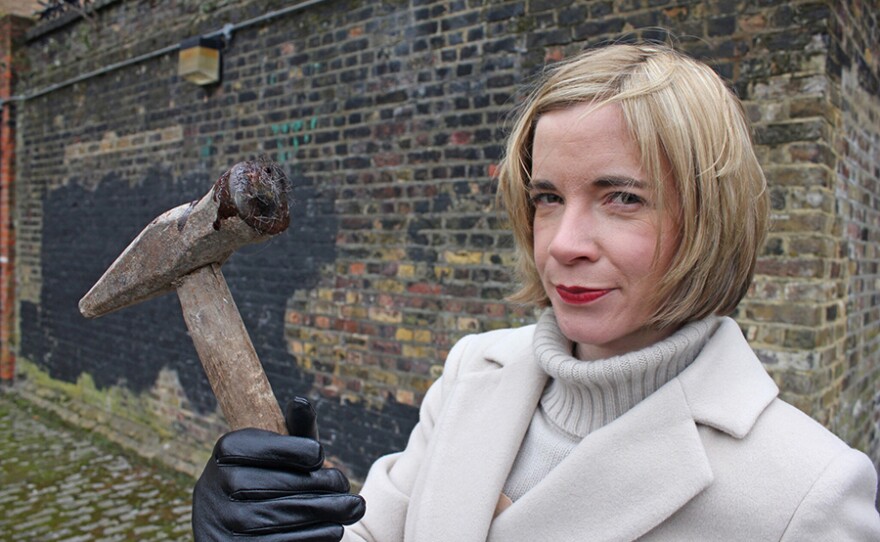 Lucy Worsley with Ratcliff Highway murder weapon in A VERY BRITISH MURDER.