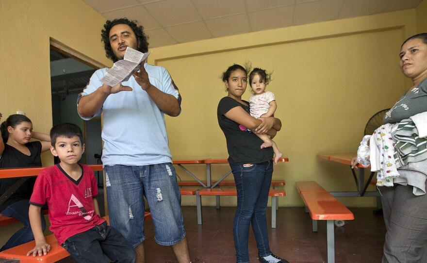 Menelio Briones, 32, along with his wife Marinelis Sabillón, 33, and their five children arrive at the El Edén center in San Pedro Sula, Honduras. They were attempting to reach the U.S., but were picked up in Mexico and deported.