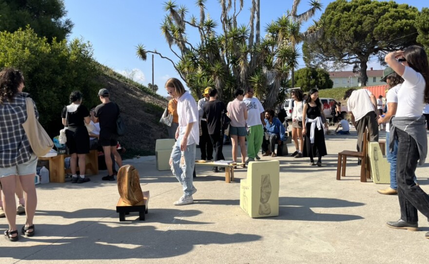 Visitors explore installations and art at Other Places Art Fair in Los Angeles in an undated photo.