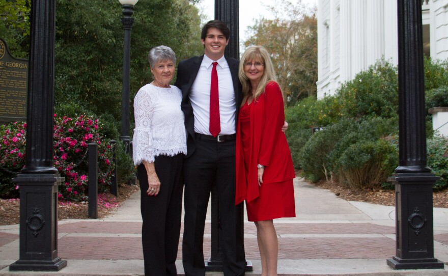 Student doctor Paul Michael Acosta, II with his mother and his Nana two important influences in his Native American upbringing<br/>