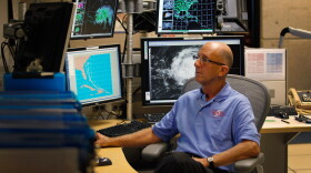Senior hurricane specialist Lixion Avila studies computer models as he tracks Hurricane Irene at the National Hurricane Center on August 22, 2011 in Miami, Florida.