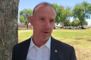 John Hemmerling, a candidate for San Diego Sheriff, speaks in a park in Allied Gardens, May 13, 2022.